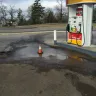 Shell - gas spill washed into storm drain
