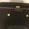 Malaysia Airlines - suitcase handle and trolley wheel broken
