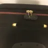 Malaysia Airlines - suitcase handle and trolley wheel broken - Photo 2