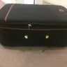 Malaysia Airlines - suitcase handle and trolley wheel broken