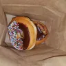 Dunkin' Donuts - chocolate frosted donuts with sprinkles