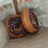 Dunkin' Donuts - chocolate frosted donuts with sprinkles