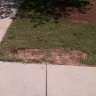 Spectrum.com - workers have left wire exposed and torn up our grass - Photo 1