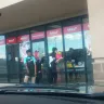 Sally Beauty Supply - employees smoking at entrance - Photo 1
