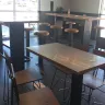 Chipotle Mexican Grill - line was dirty tables inside and outside were very dirty. - Photo 1