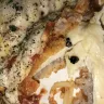 Olive Garden - there was a beetle inside of my chicken that was served to me.