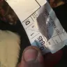 Domino's Pizza - old food being delivered with another delivery sticker on it - Photo 1