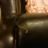 Lane Home Furniture - two leather recliners are peeling