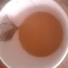 Tim Hortons - yuky group of head hair inside the cup of coffee