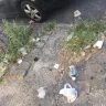 Crunch Fitness - garbage at storefront - Photo 5