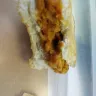 Asda Stores - a piece of paper found embedded in one of asda's spicy piri piri bean burgers