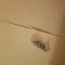 Motel 6 - the room had used needles, socks and a sticker on the wall that came off of someones pants - Photo 1