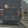 UPS - ups driver obstructing line of sight for pedestrain and driver at intersection due parkjng at red zone and block cross walk