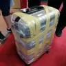 AirAsia - damaged luggage - Photo 4