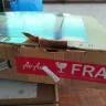 AirAsia - damage of an electronic in a checked in luggage box