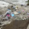 Real Canadian Superstore - entrance to the store littered with garbage
