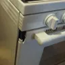 Maytag - complaint regarding the delivery of my maytag gas range, model #mgr6600fw; delivered april 28 at approx 1:00 pm - Photo 1