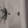 Dollar Tree - unsanitary bathroom sink with rotted faucet