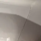Frigidaire - side-by-side frigidaire refrigerator less than four years old - cracked inner lining - Photo 1 - comment #2239381