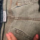 JC Penney - print on front of shirt is peeling off, a lot! I haven't even washed yet! - Photo 3 - comment #2028429